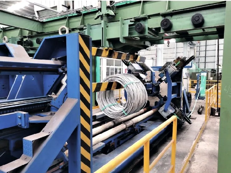 REPCH3-4600R-PS 25/32 horizontal coil compactor with PET strap, in a mill.
