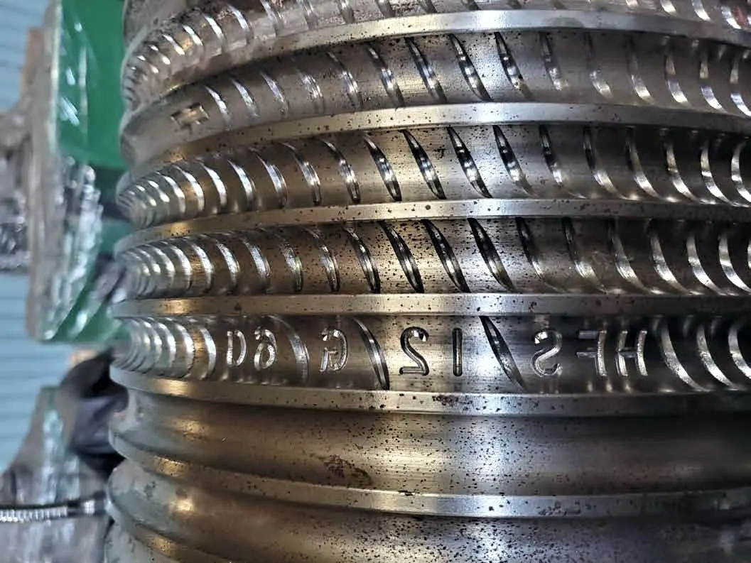 Rib grooves milled into a roll.