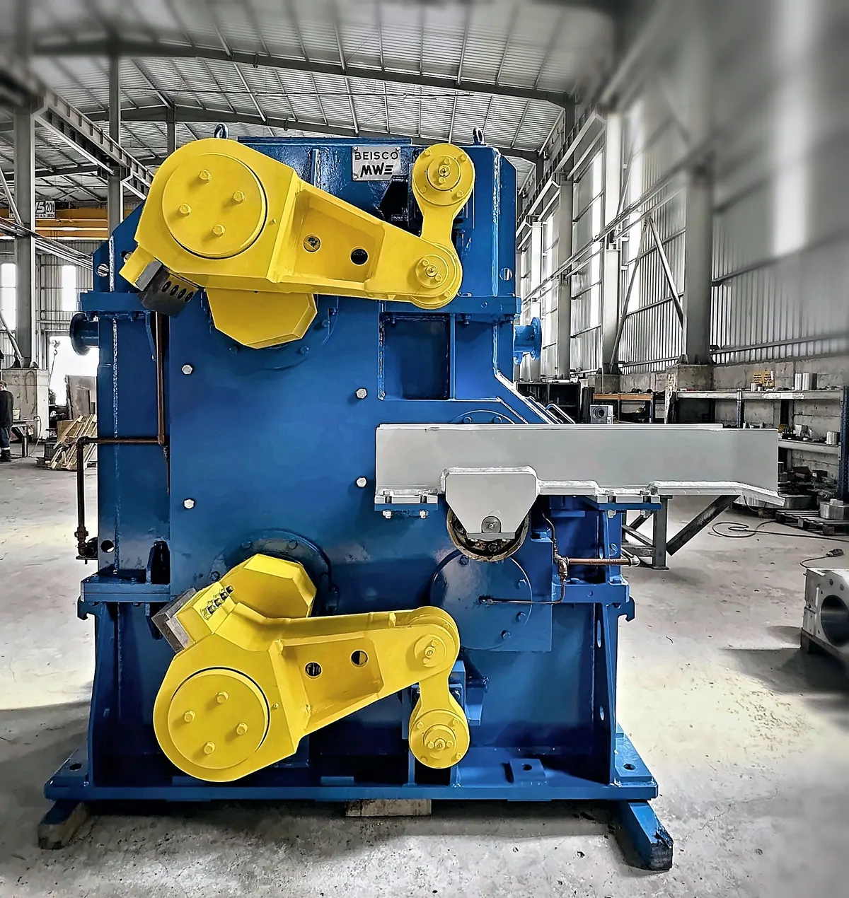 Rolling mill shear in the workshop, blade carriers visible